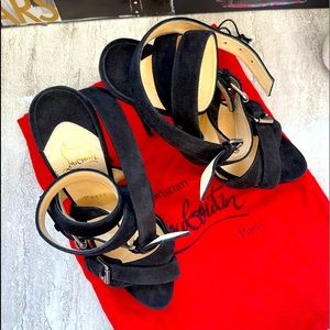 Black suede Christian Louboutin platform with crossover straps